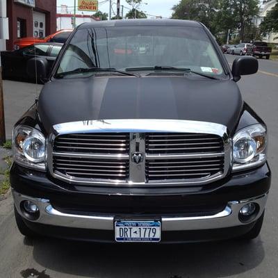 Dodge 1500 Carbon fiber wrap with matte black racing stripes.