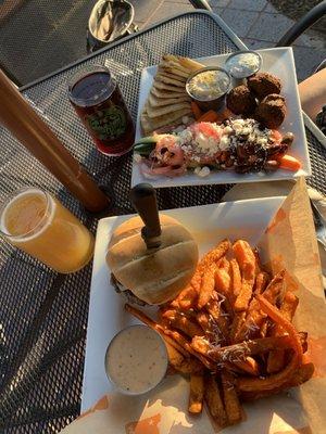 The falafel plate and a yum-o burger with sweet potato fries! IPA and cider were so good!