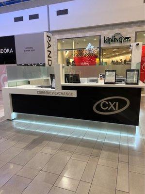 New currency exchange desk in front of Adidas