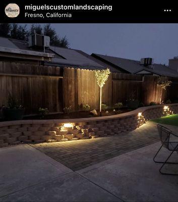 Picture of yard at night with lights installed