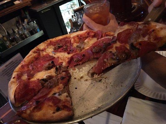 A small Da Big Joey. Pepperoni, sausage, salami, & mushroom. Respectable pizza for a bar.