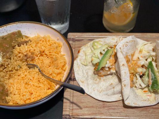 Mahi Mahi tacos with a giant side of rice and beans