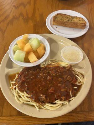 Spaghetti and Meat Sauce with a side of Melons