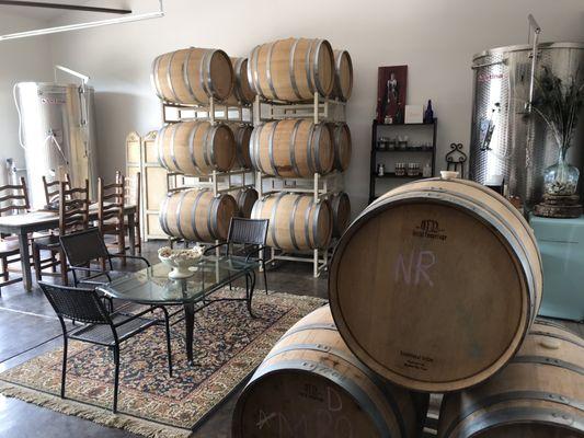 Enjoy tastings in the barrel room.