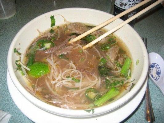 Bowl of pho. Half-eaten.