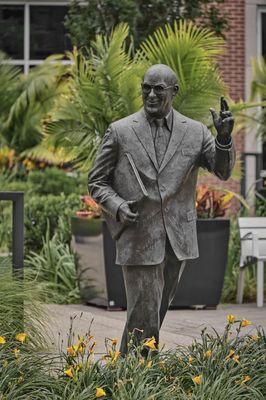 Who is this man who is waving to Mr Brown's statue?