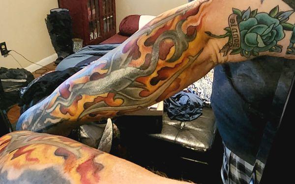 The flames were done yesterday by Dan and the rose was done a couple months ago by Dana. Wonderful work