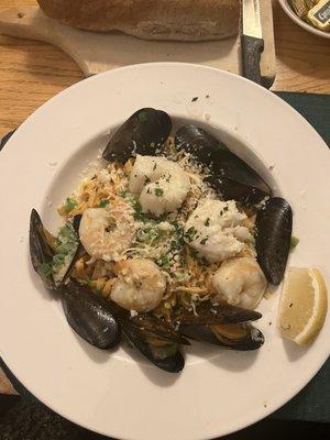 seafood linguine with homemade pasta, salad, baked French onion, and special appetizer from the chef (scallop in puff pastry)