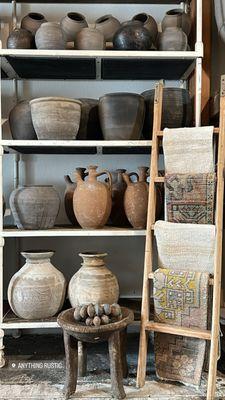 Ceramics. Clay pottery. Wood pots. Turkish rugs. Senufo stools.