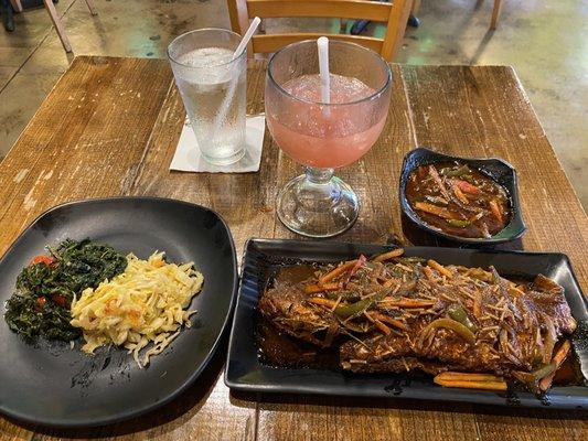 Brown Stew Fish (Red Snapper), Spinach, and Cabbage.