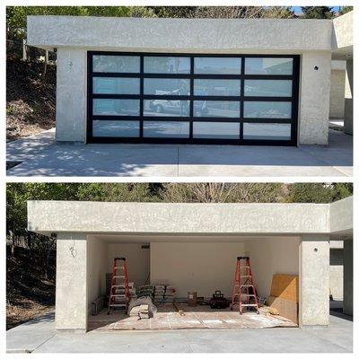 Full view glass garage door installation,    black frame with white laminated glass.                     Los Angeles, CA