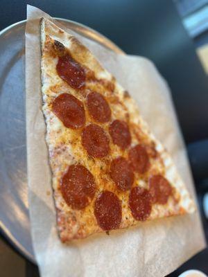 Pepperoni pizza slice