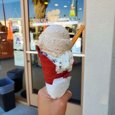 Amaretto and stracciatella in a red velvet waffle cone