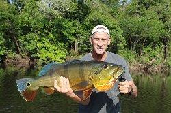 Mike Augat, owner of Pesca Panama lodge catching a Colombian grande at Las Lagunas!!!