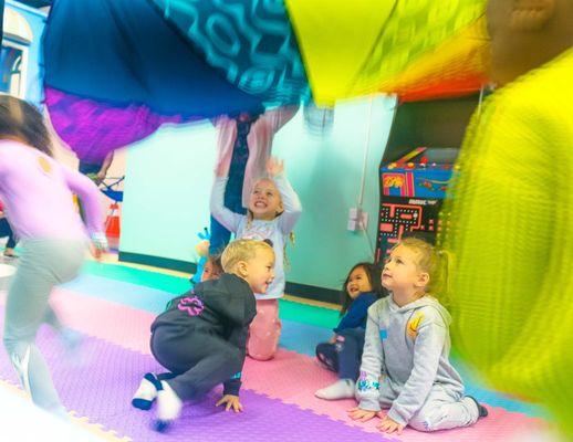 Parachute game with toddlers