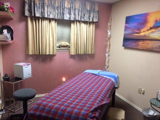 Massage with complementary hot stones, hot towels & aromatherapy