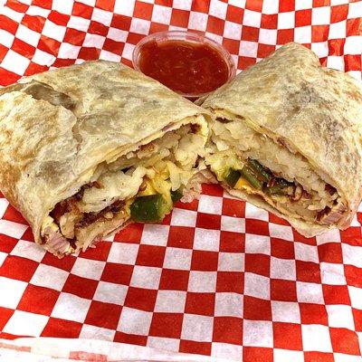 Ham, egg & cheese breakfast burrito w/ onions, jalapeños & hash-browns, so nice.