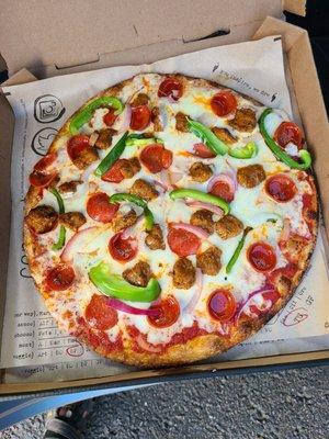 Amazing combo pizza. Yummy spicy Italian sausage