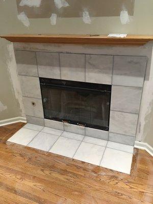 Rebuilt fireplace and bathroom floor.