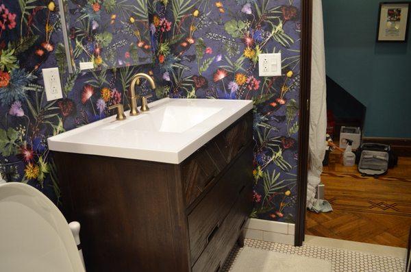 Bathroom remodeling and wallpapering.