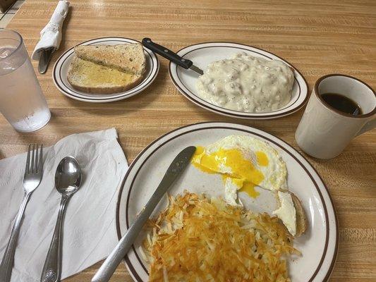 The "He Man Special" - Country Fried Steak w/ sausage gravy, hash browns, eggs n toast.