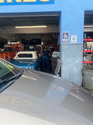 Mr. Roger fixing my tire