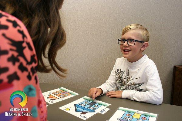 A young boy participates in speech therapy at Big Horn Basin Hearing and Speech in Cody, WY.