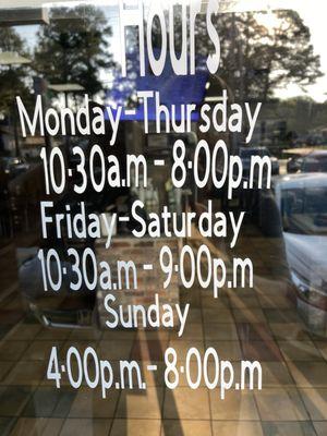 hours of operation posted on front window