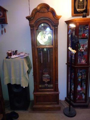 This clock is a Howard Miller $1600 Bought April 17, 1987  Height 6' 8"