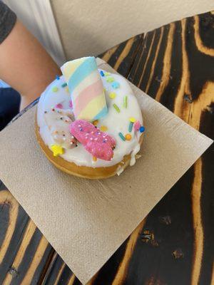 Donut with Vanilla Icing, sprinkles, marshmallows, and frosted animal crackers. YUMMMY