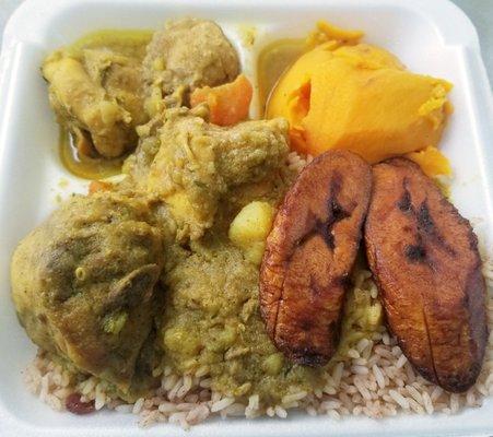 Curry chicken, rice and peas, candied yams and plantains