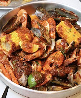 CNS COMBO  Mix and Match any 3lbs: Shrimp, green mussel, blue mussel, clam, and crawfish.  Includes: Corn, Sausage, and potatoes