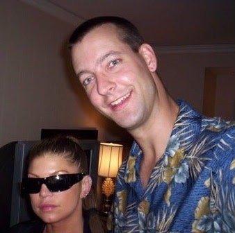 The one and only Fergie, here with Keith Quillin after he did  her eyebrow piercing.