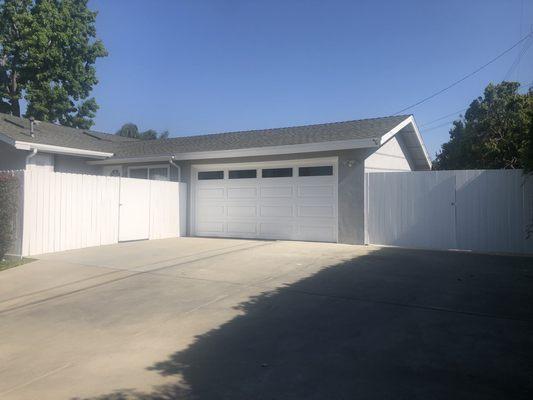 After. Neutral Wave for the stucco, Iron-IC for the brick (front of house and chimney), and Sugar Swizzle for the fascia, fence, and gate!