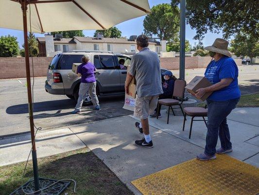 Giving free food boxes and bags out to the community on the 4th Wednesday of the month