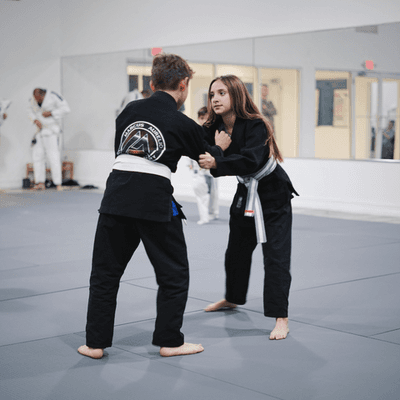 Black Belt Club Kids learning while practicing drills.