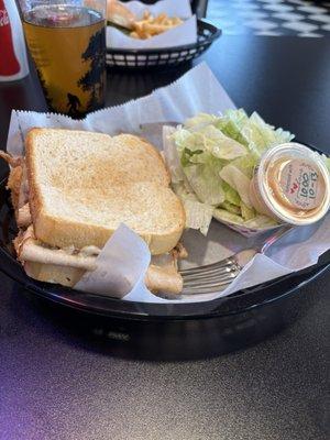 Fire Roasted Turkey on sourdough sandwich with a side salad & 1000 island dressing