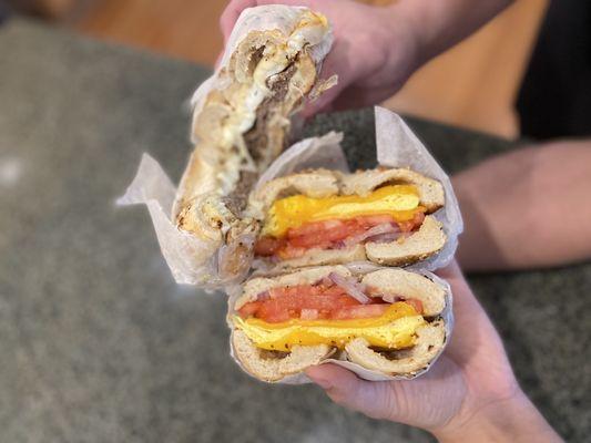 Steak, egg and cheese on an everything bagel