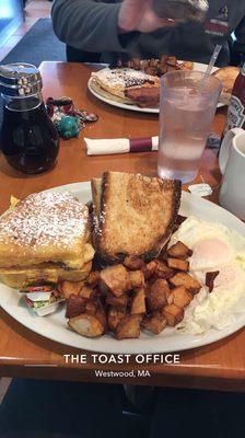 "The Toast Office" with eggs over easy and banana Nutella stuffed French toast