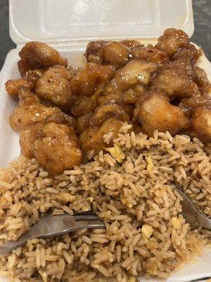 Orange chicken and fried rice(had peas and carrots in it, but I gave most to my baby).