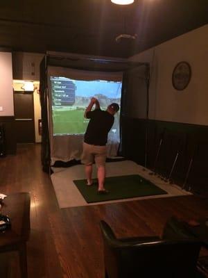 Golf simulator inside Nicks Cigar Lounge in North Myrtle Beach