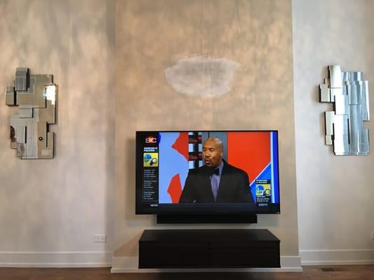 (2)Bronzeville: TV, soundbar and floating cabinet installed with no wires visible. Another satisfied client.