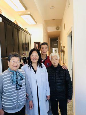 Dr. Li and her patients in Chicago practice .