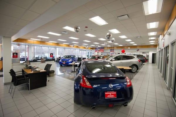 Massapequa Nissan Showroom.  We welcome you to stop by and check out our new and used Nissan cars.