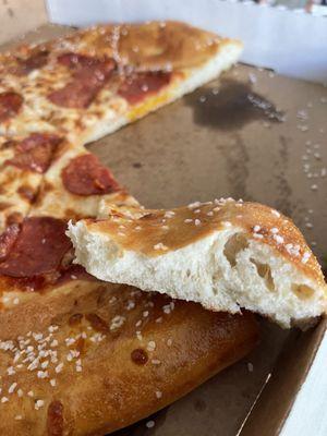 this was supposedly a "pretzel pizza." putting rock salt on a dough does not make it a pretzel.