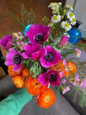 Bright ranunculuses and anemones