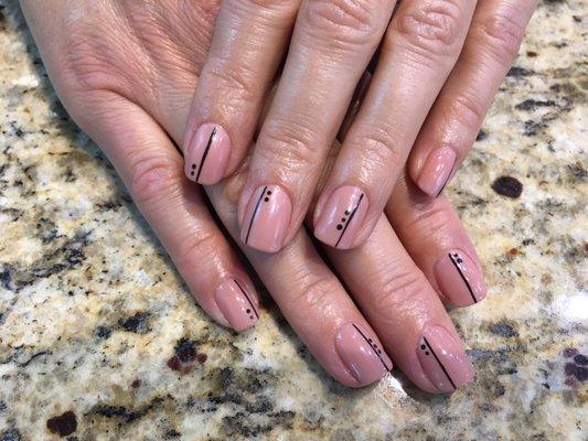 Theresa (nail tech) always keeps me on trend. Love my minimalist nails!