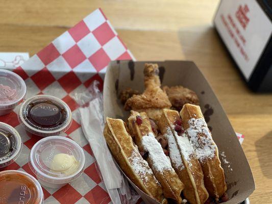 Fried chicken with bacon and cheese waffle.