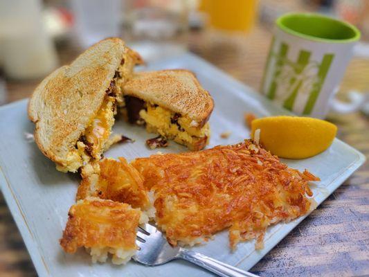 Breakfast sandwich and crispy hashbrowns