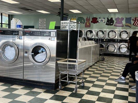 All the washers and dryers full of commercial laundry.